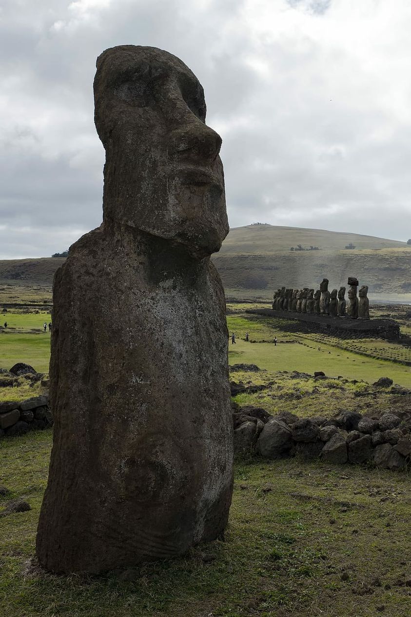 Easter Island heads prehistoric art black rock boulders travelandhome Polynesia